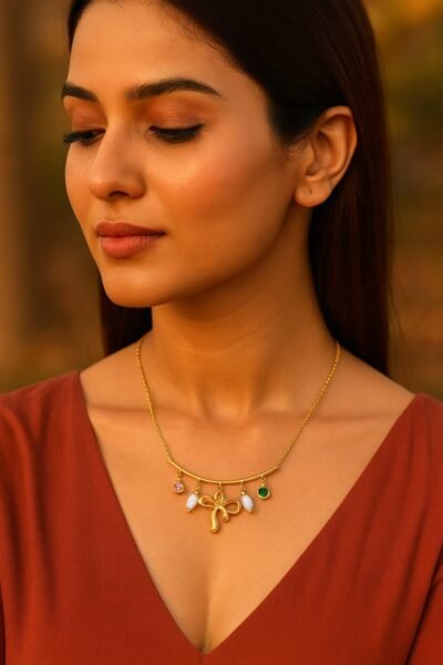 Golden Charm Bow Necklace - Image 2