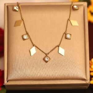 Elegant Gold-Tone Charm Necklace with Crystals