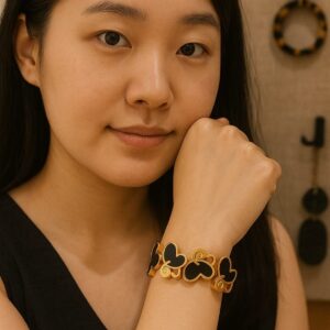 Stylish Black Enamel Heart Motif Gold-Tone Bracelet