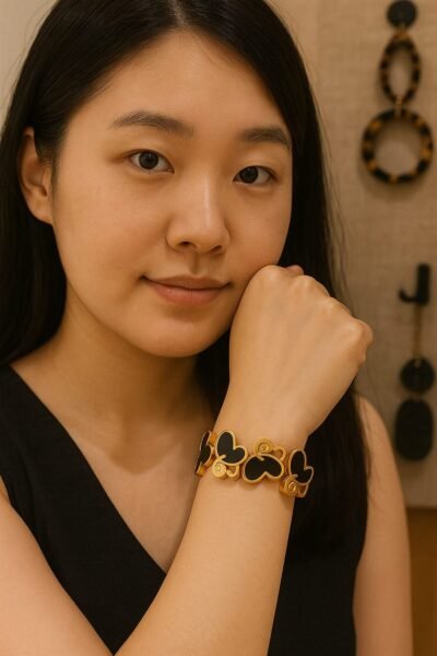 Stylish Black Enamel Heart Motif Gold-Tone Bracelet