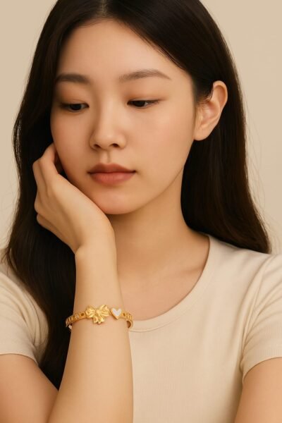 Golden Bow & Heart Charm Bangle