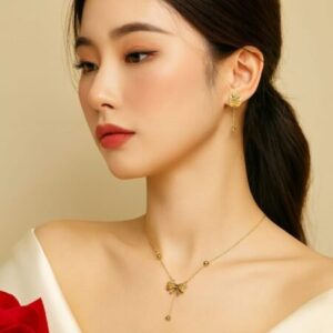 Golden Bow Pendant Necklace & Drop Earrings Combo Set